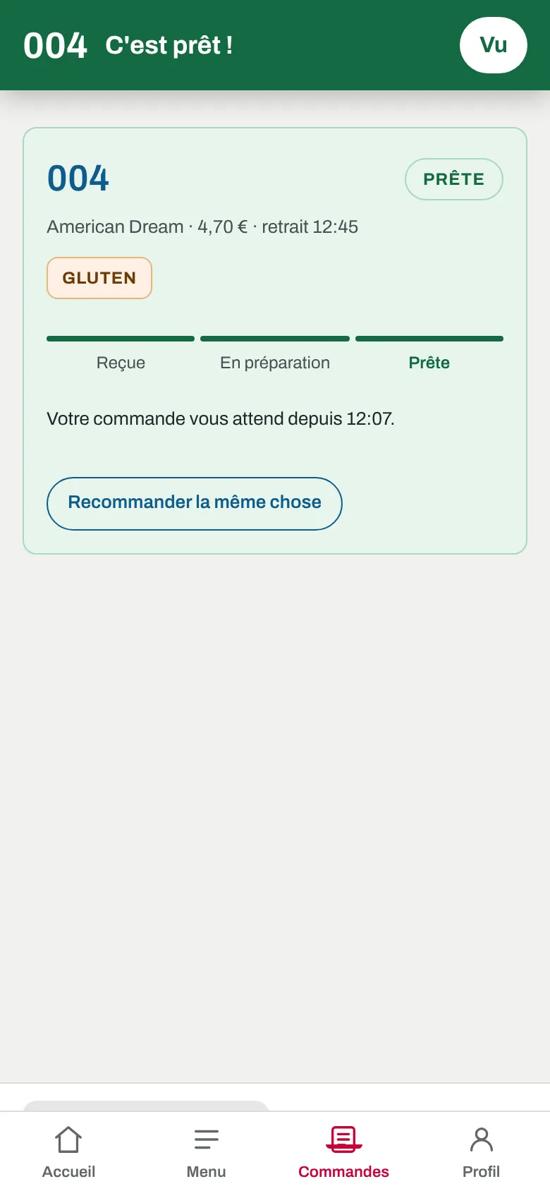 Le suivi de commande sur le téléphone : la commande est marquée prête, avec un bandeau vert « C'est prêt ».